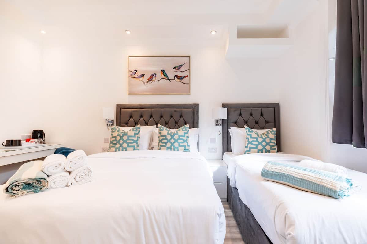 Double Room, Ensuite (With-Extra-Bed) | Blackout drapes, iron/ironing board, free WiFi