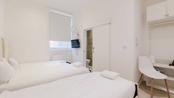 Standard-Dreibettzimmer, mit Bad | Strand