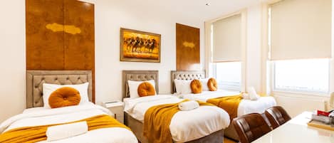 Habitación cuádruple Premium, baño privado (External) | 1 habitación, wifi gratis y ropa de cama