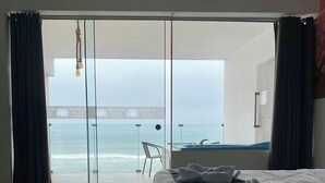 Suite estudio, vistas a la playa | Ropa de cama de alta calidad y minibar