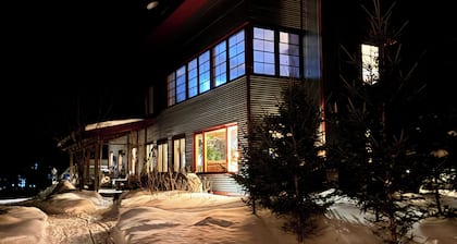 Modern south facing lake property in East Harris Bay on Whiteface Reservoir.