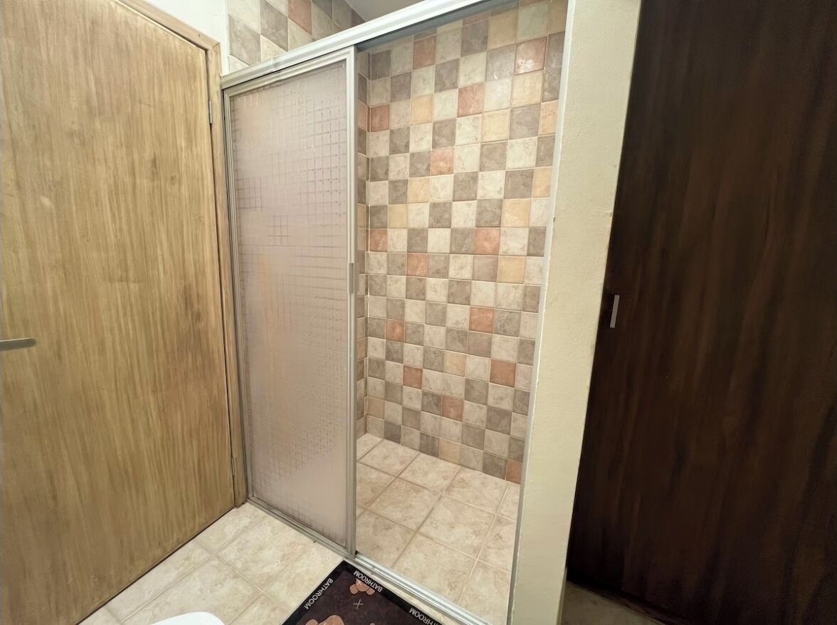 Shower, towels, soap, toilet paper