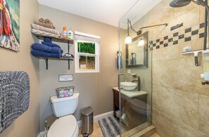 Shower, hair dryer, towels, soap