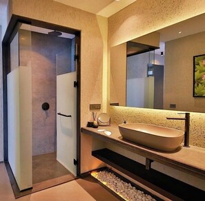 Deluxe Apartment, Sea View, Beachfront | Bathroom | Bathrobes, slippers
