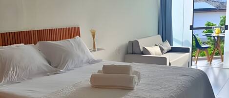 1 slaapkamer, een strijkplank/strijkijzer, beddengoed