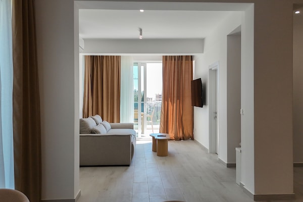 Apartment, 2 Bedrooms | Living area | Flat-screen TV