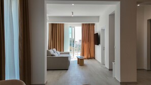 Apartment, 2 Bedrooms | Living area | Flat-screen TV
