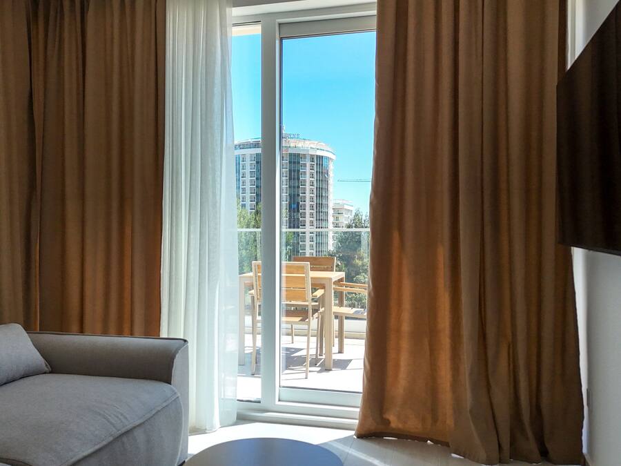 Apartment, 2 Bedrooms | Living area | Flat-screen TV