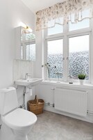 Deluxe Apartment, 2 Bedrooms | Bathroom | Shower, hair dryer, towels, soap