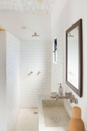 Shower, towels, soap, toilet paper