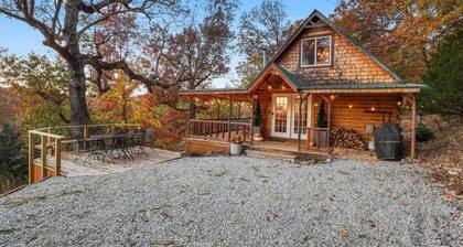 Picturesque 3-bedroom Cabin Hideaway in a wooded setting with a lake view!