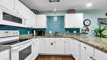 Condo, Multiple Beds (Gulf Place Caribbean 413- Aqua Vista ) | Private kitchen | Oven, toaster