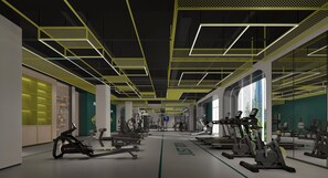 Un gimnasio moderno con varios equipos de ejercicio, incluyendo cintas de correr y máquinas de pesas, y una amplia pared de espejos.