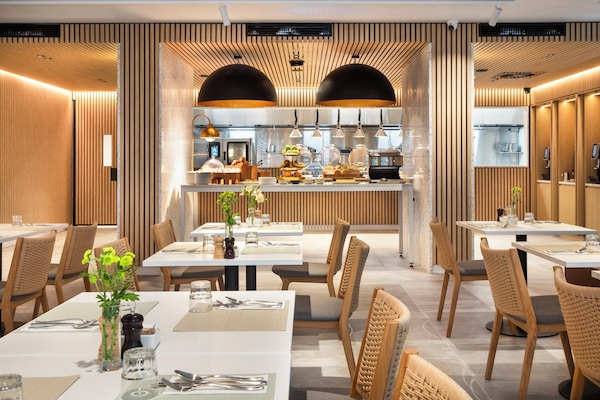 Daily buffet breakfast (AUD 40 per person)