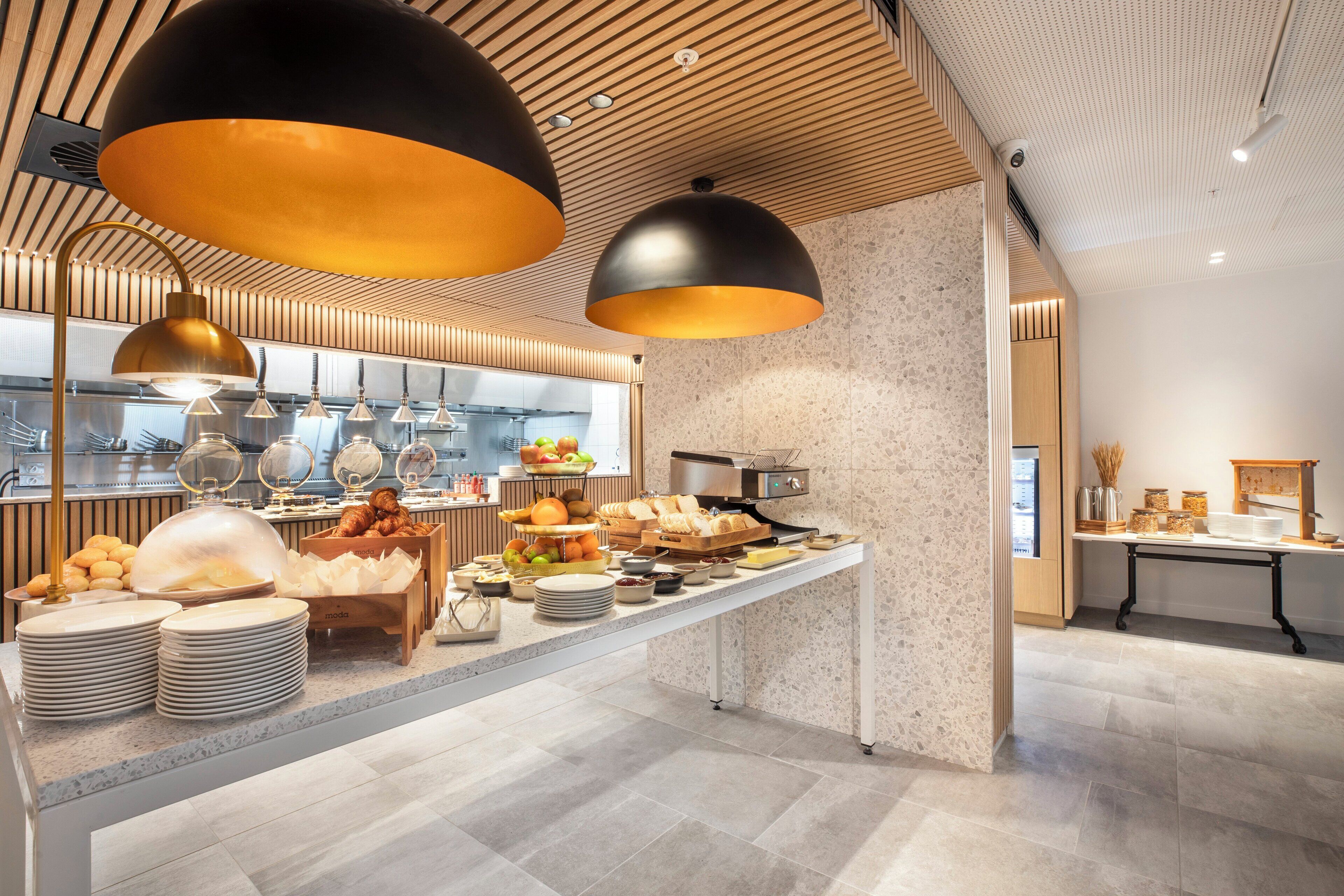 A modern breakfast buffet with a variety of food items and a clean, contemporary design.