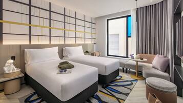 Quarto standard, 2 camas de solteiro | Frigobar, berços grátis, Wi-Fi de cortesia, roupa de cama