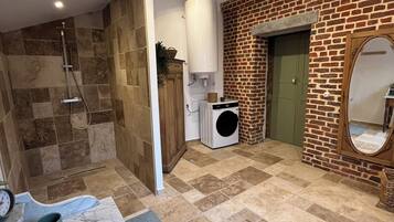 Shower, hair dryer, towels, toilet paper