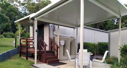 Fully equiped unit on residential acreage. Minutes to river, beaches and shops.