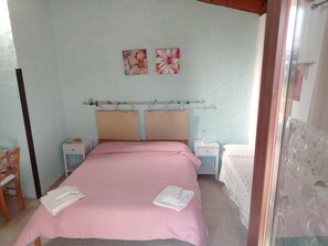 Comfort Triple Room, Garden View | 1 bedroom, blackout curtains, iron/ironing board