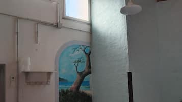 Comfort Triple Room, Garden View | 1 bedroom, blackout curtains, iron/ironing board