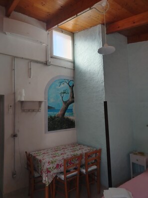 Comfort Triple Room, Garden View | 1 bedroom, blackout curtains, iron/ironing board