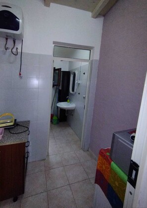 Comfort Triple Room, Garden View | In-room dining