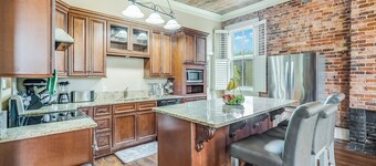 Historic Downtown Escape 2 bedroom Condo on the Bricks with Private Parking