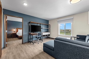 Suite, 1 King Bed, Non Smoking (Upgrade) | Desk, laptop workspace, blackout drapes, iron/ironing board - Everhome Suites Brownsville (Brownsville)