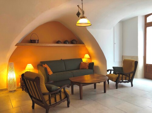 "la maison de Marie" 17th century village house stone arches courtyard + terrace