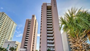 Two high-rise buildings with balconies, one labeled "PALMS" and the other "PALMS".