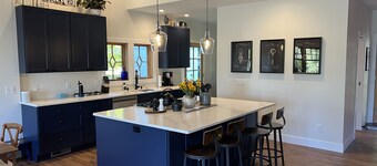 Spacious 5-bedroom farmhouse in lovely Omena, MI with AC, WiFi & lake views