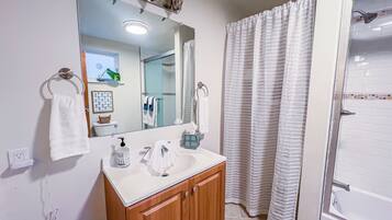 Hair dryer, towels, soap, toilet paper