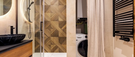 Shower, free toiletries, hair dryer, towels