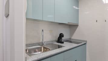 Fridge, microwave, stovetop, coffee/tea maker