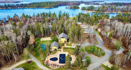 Lakeview Home with Dock on the Whitefish Chain, Outdoor Pool, Pickleball & More
