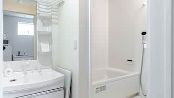 Hair dryer, bidet, towels, soap