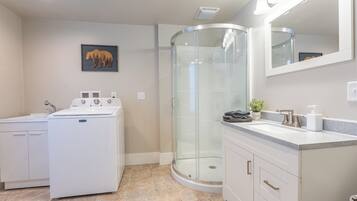 Shower, hair dryer, towels, soap