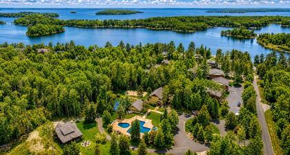Lakeview Home with Dock on the Whitefish Chain, Outdoor Pool, Pickleball & More