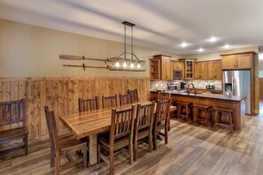 Enjoy cooking in this well-equipped kitchen with a central island, microwave, and dining area.
