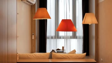 Deluxe Apartment, Lake View | Desk, laptop workspace, blackout drapes, soundproofing