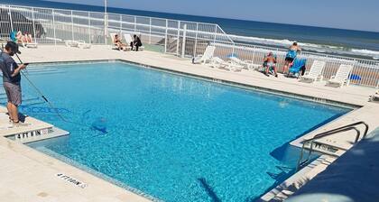 Come chill with us. Enjoy this cozy condo with beach access and a pool.