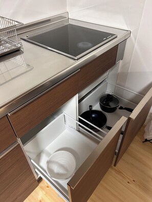 Fridge, microwave, electric kettle, high chair