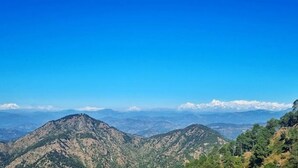 A mountainous landscape with clear skies. - The Wild Cliff (Dhari)