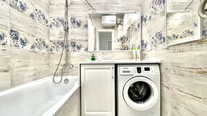 Classic Apartment, Balcony, City View | Bathroom - HomeApart Peter Mstivlavets 15 (Minsk)
