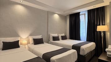 Family Condo, Courtyard View | 1 bedroom, premium bedding, minibar, desk