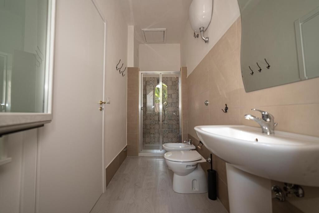 Apartment, 1 Double Bed with Sofa bed | Bathroom | Shower, towels, toilet paper