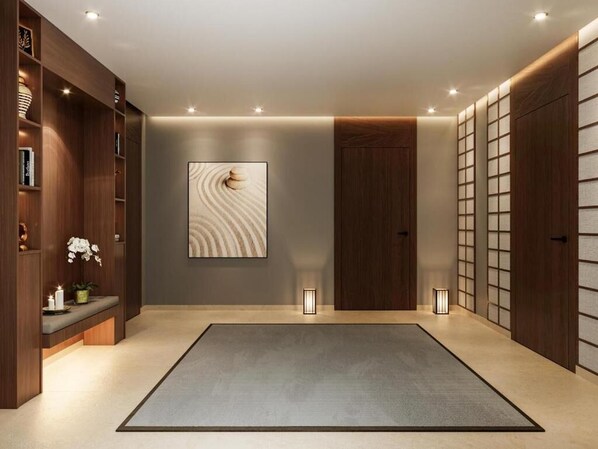 A modern interior with a large rug, wooden shelving, and a wall-mounted artwork. - Citadines Almaz Casablanca (Casablanca)