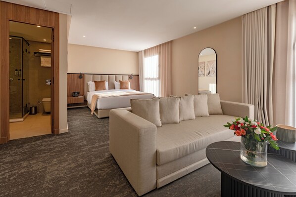 Executive studio suite | Een kluis op de kamer, geluiddichte muren, gratis wifi, beddengoed