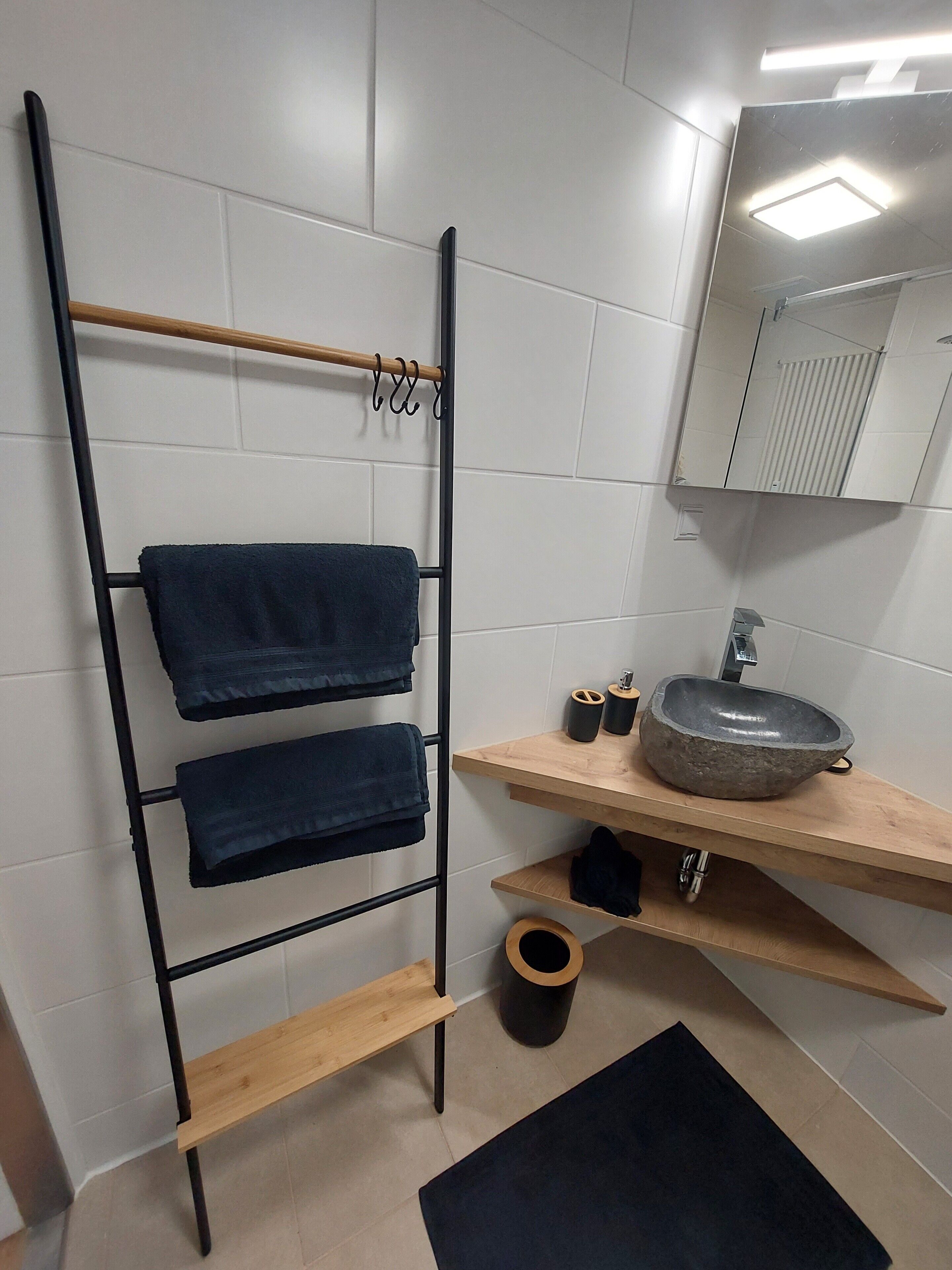 Shower, hair dryer, towels