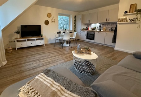 TV. Apartment 'Hygge' with Private Terrace, Private Garden and Wi-Fi